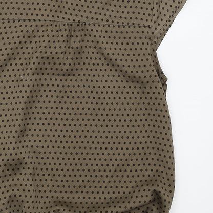 Brand and care label for S.Y women’s brown polka dot basic blouse, size M