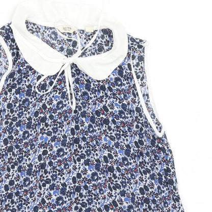 Close-up detail of Jack Wills women’s blue floral basic blouse, size UK 8