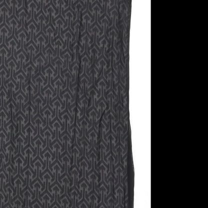 Brand and care label for Marks & Spencer women’s black geometric basic tank, size UK 12, - black and white