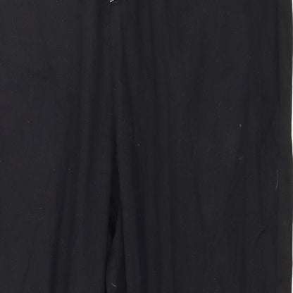 Close-up detail of PRETTYLITTLETHING women’s black trousers, size UK 6, 28-inch leg