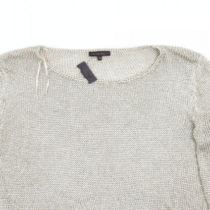 Close-up detail of Limited Edition women’s gold jumper, size UK 18
