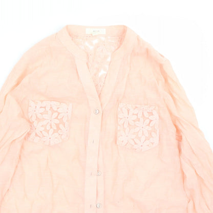 Close-up detail of Mine women’s orange basic button-up, size S