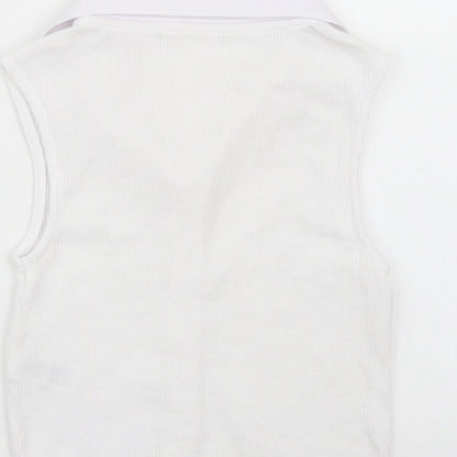 Brand and care label for Primark women’s white basic button-up, size XS