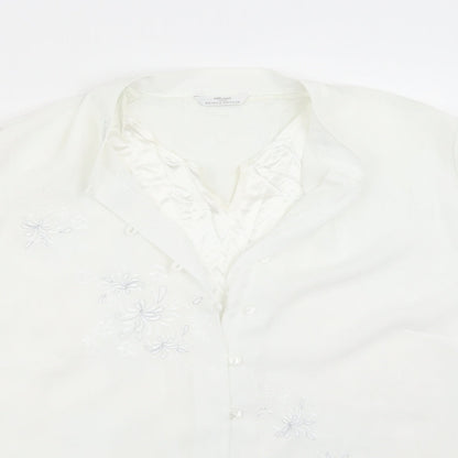 Close-up detail of Marks & Spencer women’s white basic button-up, size UK 18