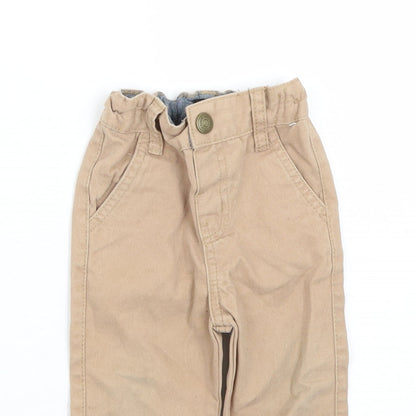 Close-up detail of Denim & Co. girls’ brown capri jeans, size 9-12, months