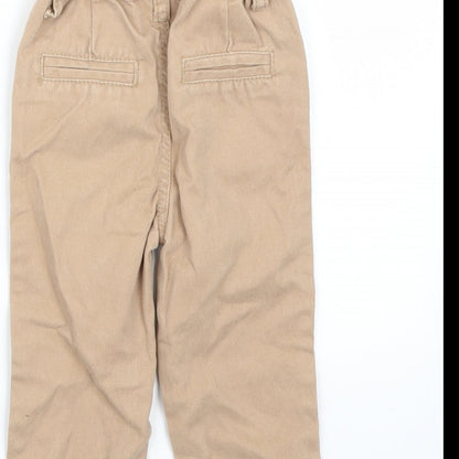 Brand and care label for Denim & Co. girls’ brown capri jeans, size 9-12, months