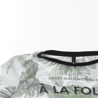 Close-up detail of H&M women’s green floral basic t-shirt, size UK 8