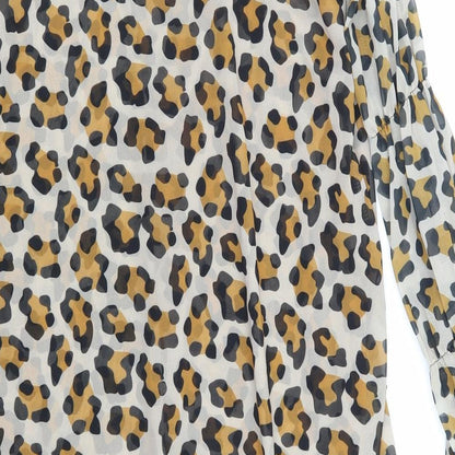 Brand and care label for orderplus women’s brown animal print basic blouse, size XL
