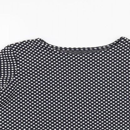 Close-up detail of St Bernard girls’ blue polka dot basic t-shirt, size 9, years