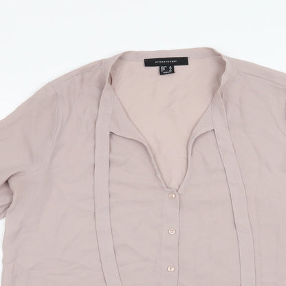 Close-up detail of Atmosphere women’s pink basic blouse, size UK 8