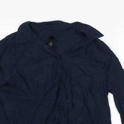 Close-up detail of Preworn women’s blue basic button-up, size M
