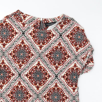 Close-up detail of Dorothy Perkins women’s red paisley basic blouse, size UK 10