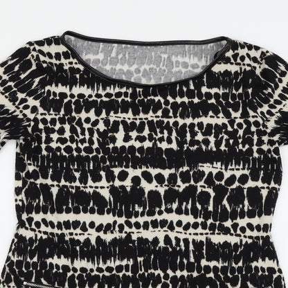 Close-up detail of F&F women’s black animal print basic blouse, size UK 8