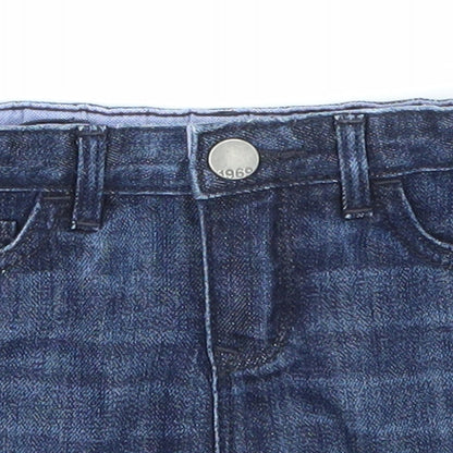 Close-up detail of Gap girls’ blue denim mini skirt, size 3, years