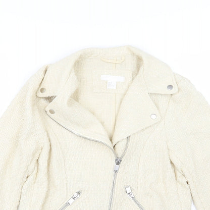 Close-up detail of H&M women’s ivory jacket, size UK 8
