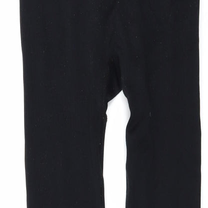 Close-up detail of WorkOut women’s black compression leggings, size S, 27-inch leg