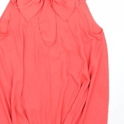 Brand and care label for Miss Selfridge women’s pink basic blouse, size UK 12