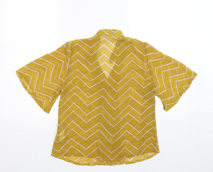 Back view of Boohoo women’s yellow striped basic button-up, size UK 8