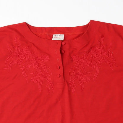 Close-up detail of Berlin women’s red basic button-up, size M