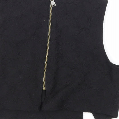 Brand and care label for River Island women’s black floral basic blouse, size UK 6