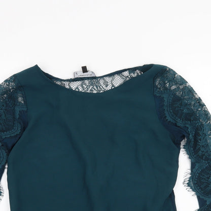 Close-up detail of Warehouse women’s green basic blouse, size UK 8