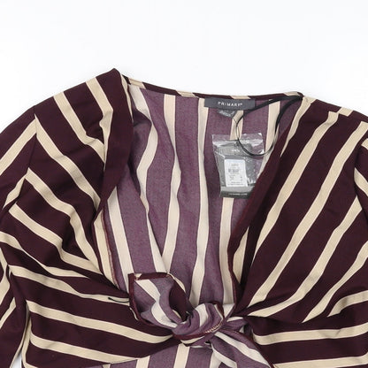 Close-up detail of Primark women’s purple striped cropped blouse, size UK 10