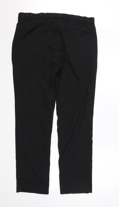 Back view of Preworn women’s black dress pants trousers, size UK 36, in, 30-inch leg