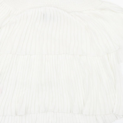 Brand and care label for F&F women’s white basic blouse, size UK 6