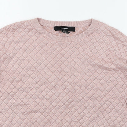 Close-up detail of Forever 21 women’s pink argyle/diamond jumper, size S