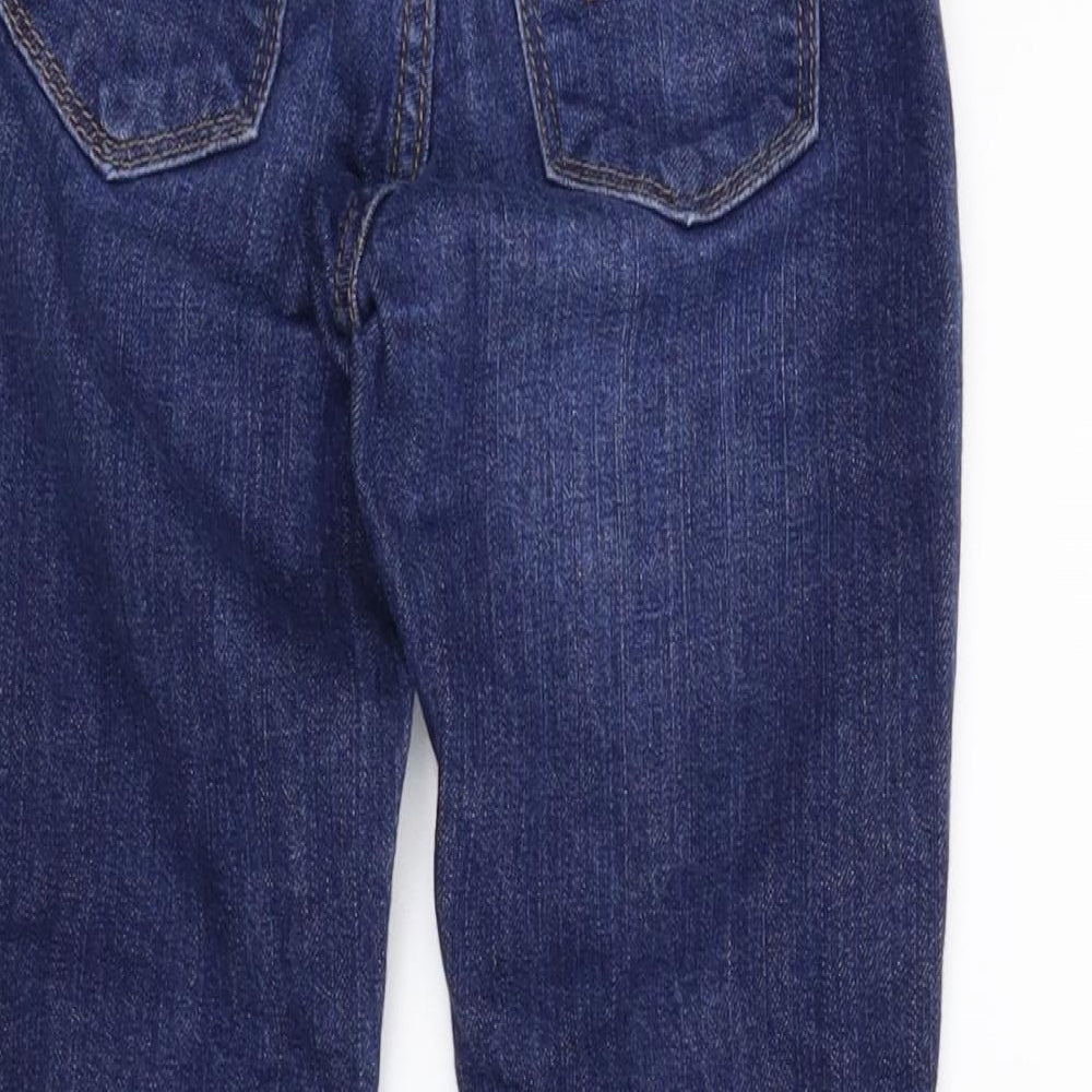 Brand and care label for Gap girls’ blue boyfriend jeans, size 7, years