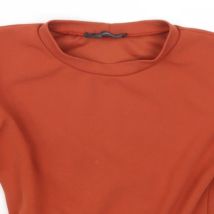 Close-up detail of Stylewise women’s orange basic t-shirt, size UK 10