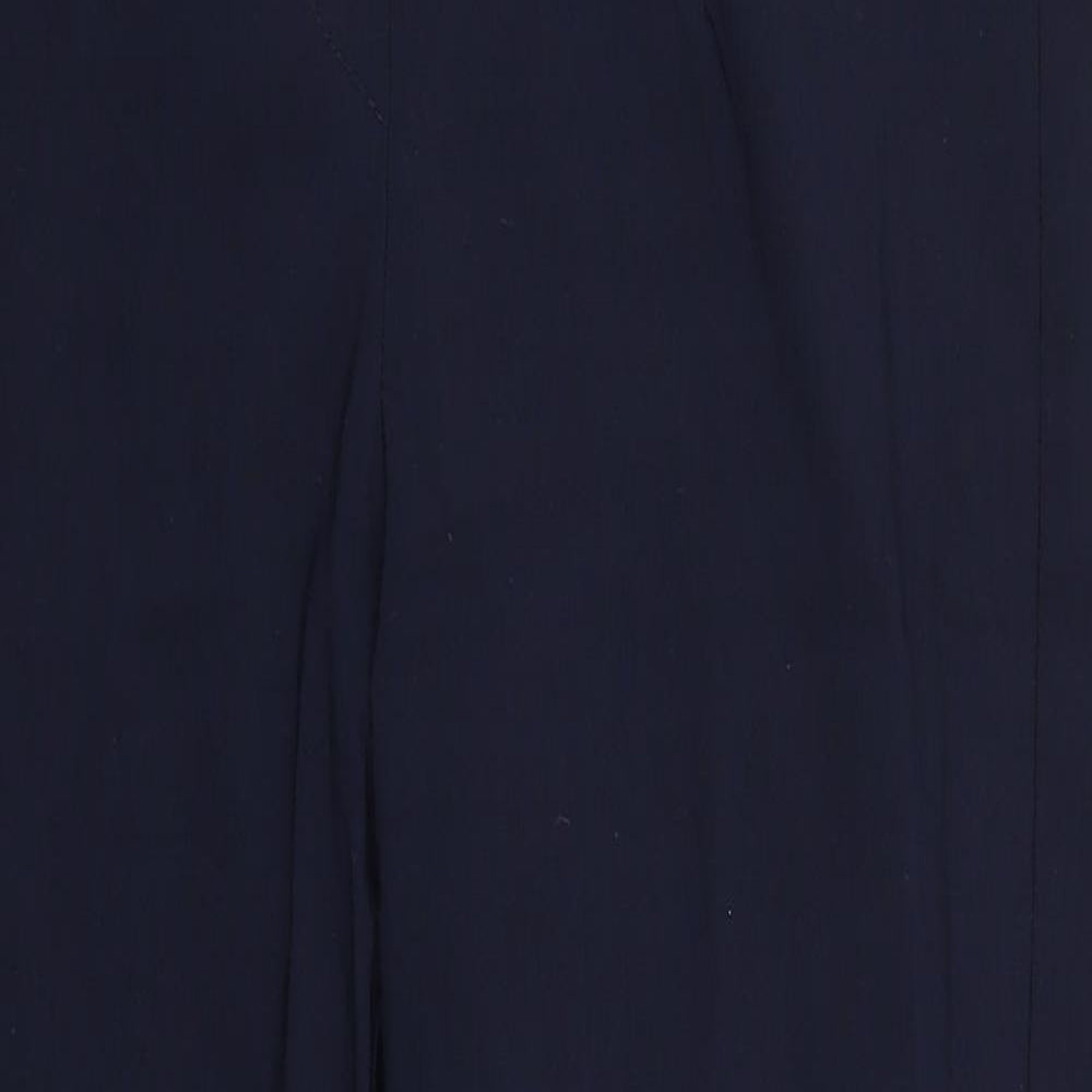 Close-up detail of Preworn women’s blue cropped trousers, size UK 32, in, 22-inch leg