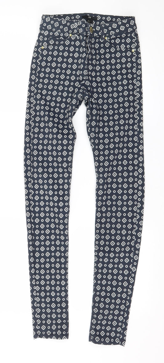 Front view of H&M women’s blue geometric denim skinny jeans, size UK 4, 28-inch leg