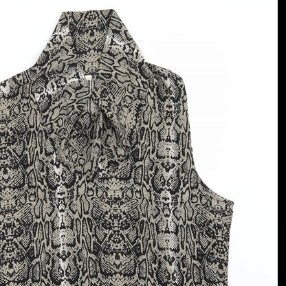 Close-up detail of Preworn women’s brown animal print rayon basic t-shirt, size L