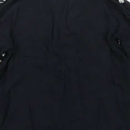 Brand and care label for Preworn women’s black basic t-shirt, size M