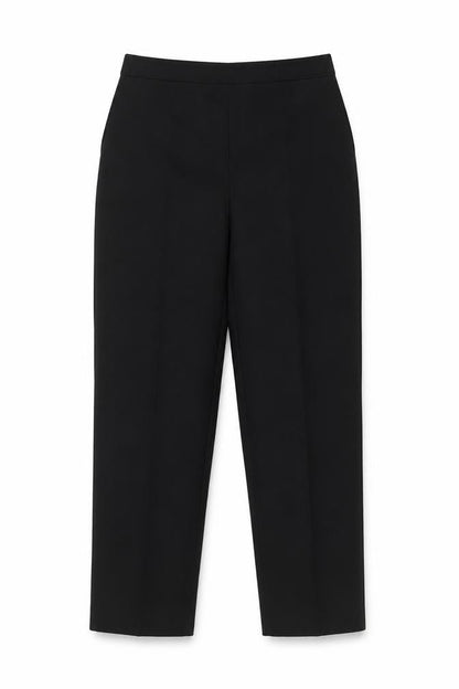 Front view of Preworn women’s black trousers, size UK 14, 24-inch leg