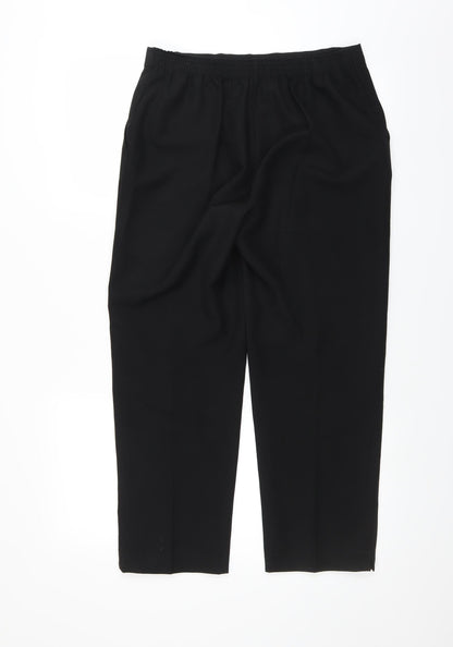 Back view of Preworn women’s black trousers, size UK 14, 24-inch leg