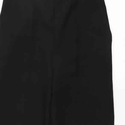 Close-up detail of Preworn women’s black trousers, size UK 14, 24-inch leg