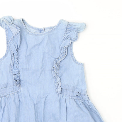 Close-up detail of Next girls’ blue a-line, size 18-24, months