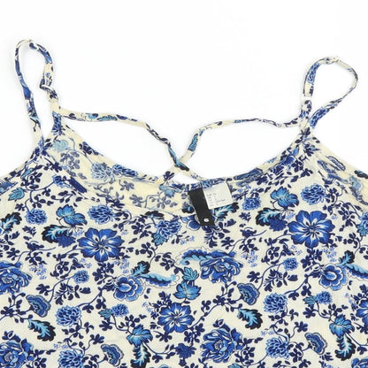 Close-up detail of Divided by H&M women’s blue floral basic tank, size UK 6