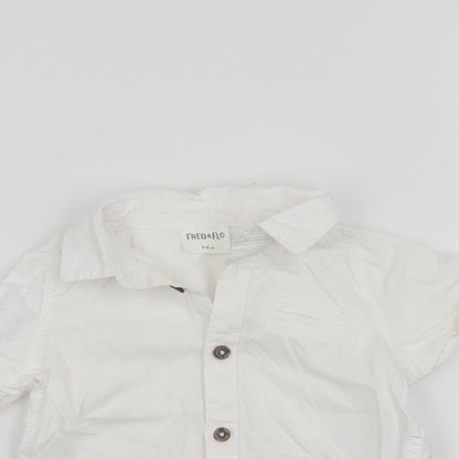 Close-up detail of F&F boys’ white basic button-up, size 3-6, months