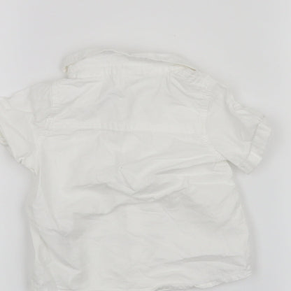 Brand and care label for F&F boys’ white basic button-up, size 3-6, months