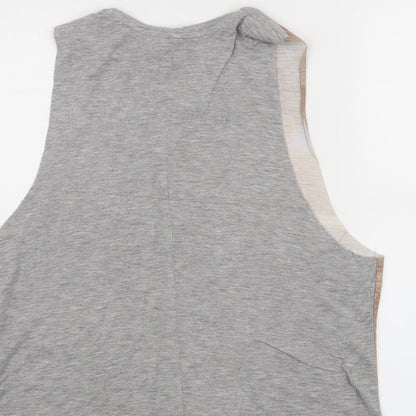 Brand and care label for Diverse women’s beige basic tank, size XS