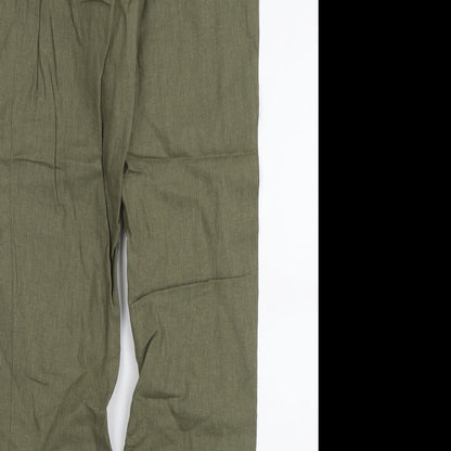 Brand and care label for H&M women’s green trousers, size UK 6