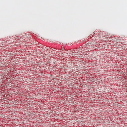 Close-up detail of Primark girls’ pink knit jumper, size 3-6, months