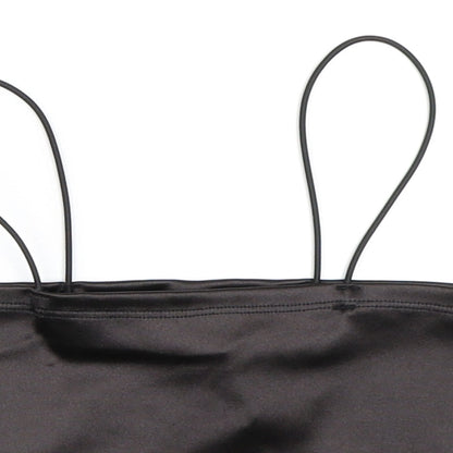 Close-up detail of H&M women’s black cropped blouse, size XS