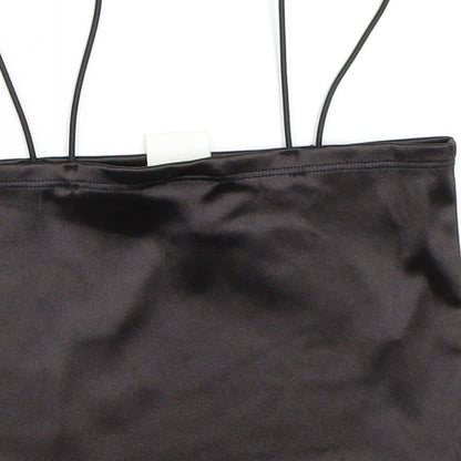 Brand and care label for H&M women’s black cropped blouse, size XS