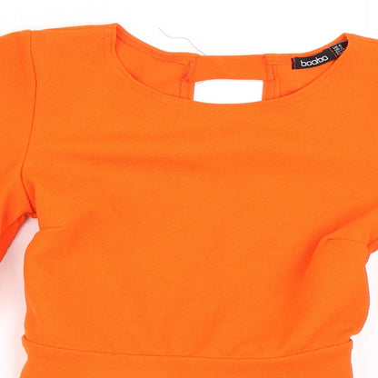 Close-up detail of Boohoo women’s orange basic blouse, size UK 6