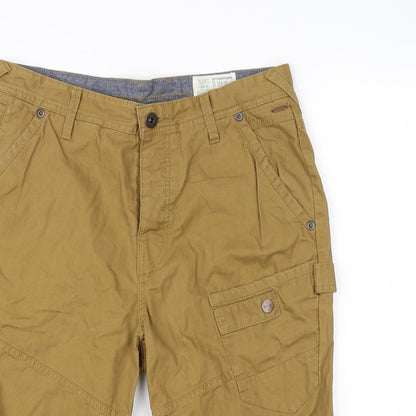 Close-up detail of Next men’s beige trousers, size 30, in, 20-inch leg