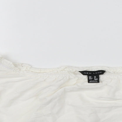 Close-up detail of New Look women’s white basic blouse, size UK 12
